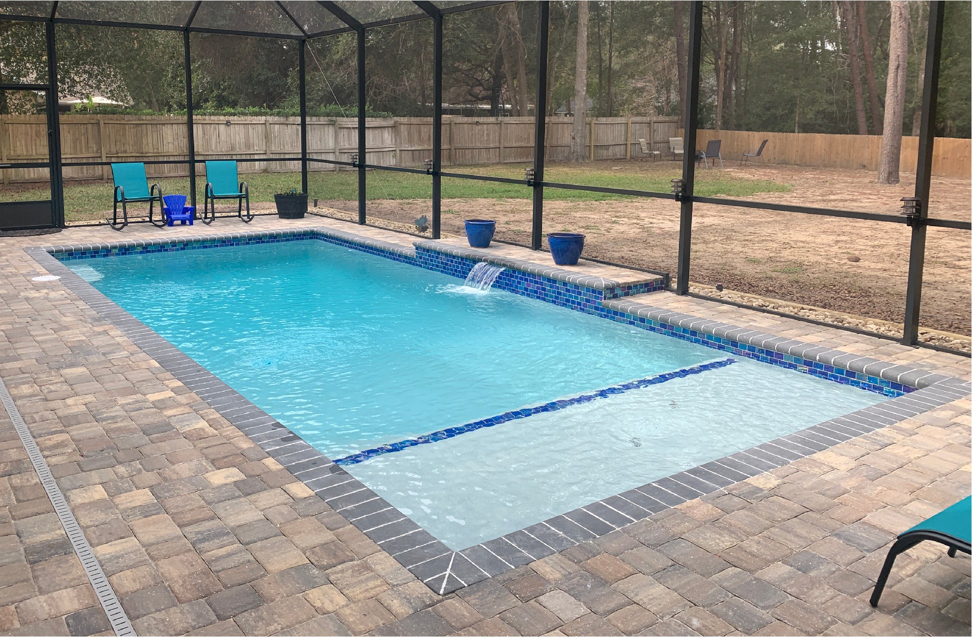 Colombia beach installed with pool tile and paver deck